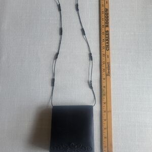 Jessica McCkintock Black Clutch with Floral Design